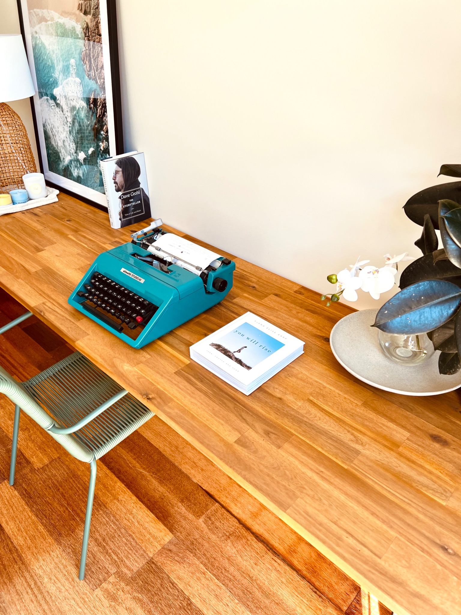 Solid hardwood table top with vintage typewriter and books